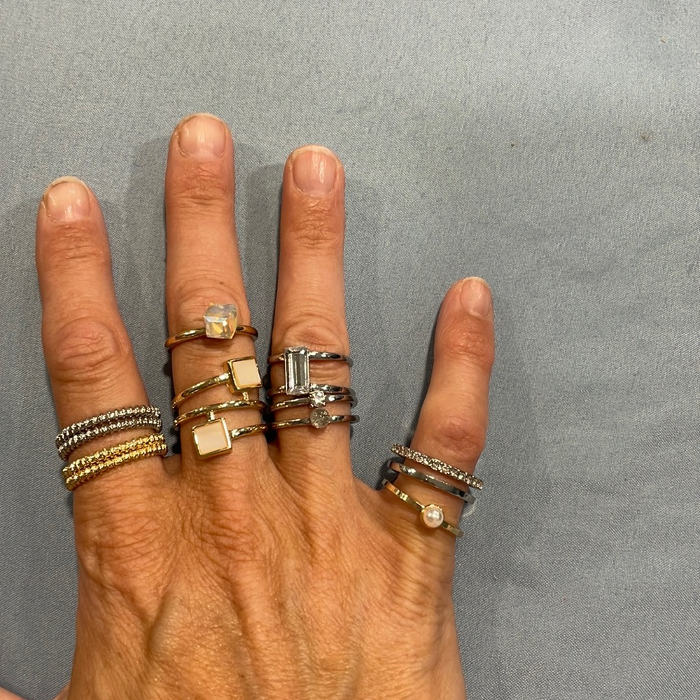 A mix of 10 gold and silver plated rings